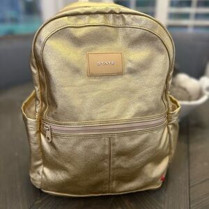 State backpack Kane double pocket gold metallic in great condition.